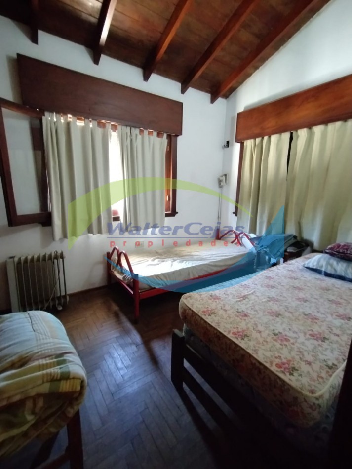 CASA EN VENTA SOBRE LOTE MULTIFAMILIAR HOTELERO